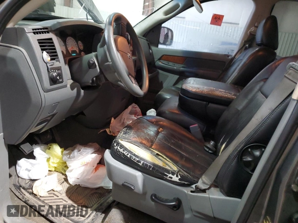 2006 Dodge 1500 SLT z VIN 1D7HA18N56S630914, wystawiony jako Copart lot #50629125 z przebiegiem 249 444 mil mil oraz Szkoda całkowita • Salvage title. Historia ofert i sprzedaży dostępna na DreamBid. Obrazek 7.