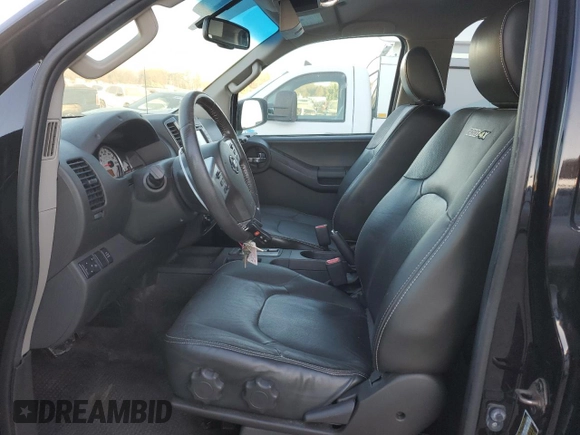 2014 Nissan Xterra X with VIN 5N1AN0NW9EN812437, listed as a Copart auction lot 83905504 with 118,805 mi miles and Salvage Title. Bid and sale history available at DreamBid. Image 7.