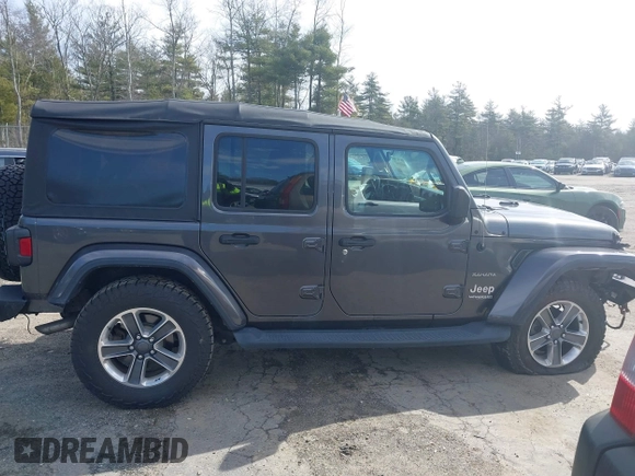 2018 Jeep Wrangler Unlimited Sahara with VIN 1C4HJXEG0JW246110, listed as a IAAI auction lot 41826662 with 65,236 mi miles. Bid and sale history available at carsss.com. Image 13.