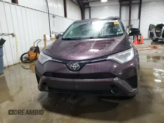 2018 Toyota RAV4 LE with VIN 2T3BFREV5JW721315, listed as a Copart auction lot 59016665 with 136,490 mi miles and Salvage title. Bid and sale history available at DreamBid. Image 5.