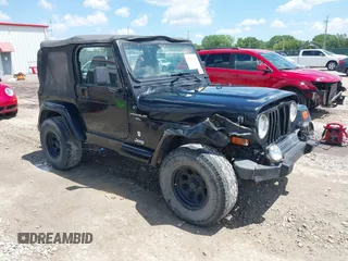 2001 Jeep Wrangler Sport z VIN 1J4FA49S71P353261, wystawiony jako IAAI lot #42234059 z przebiegiem Nie podano mil oraz . Historia ofert i sprzedaży dostępna na DreamBid. Obrazek 1.