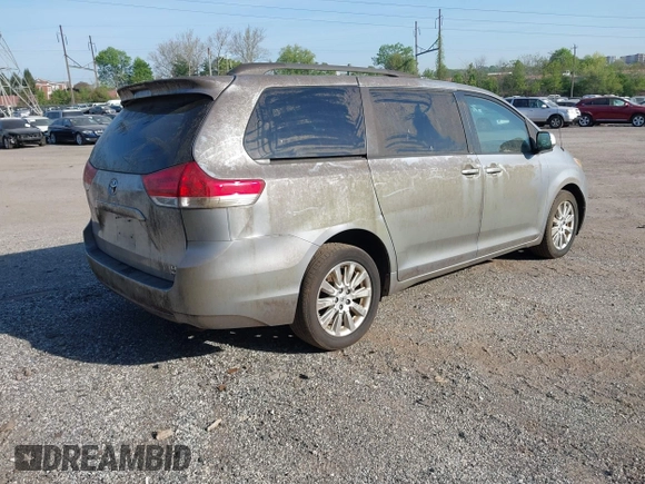 2011 Toyota Sienna LE with VIN 5TDJK3DC9BS012944, listed as a IAAI auction lot 42106998 with 108,700 mi miles. Bid and sale history available at carsss.com. Image 4.