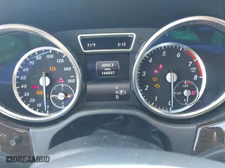 2014 Mercedes-Benz GL-Class GL 450 with VIN 4JGDF7CEXEA277610, listed as a IAAI auction lot 41909424 with 164,437 mi miles. Bid and sale history available at carsss.com. Image 7.