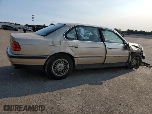 1997 BMW 7 Series 740il with VIN WBAGJ8325VDM04352, listed as a Copart auction lot 70189534 with 129,463 mi miles and Salvage Title. Bid and sale history available at carsss.com. Image 3.