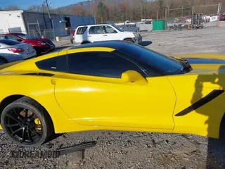 2014 Chevrolet Corvette Z51 3LT z VIN 1G1YL2D79E5118838, wystawiony jako IAAI lot #41815392 z przebiegiem Nie podano mil oraz . Historia ofert i sprzedaży dostępna na DreamBid. Obrazek 13.
