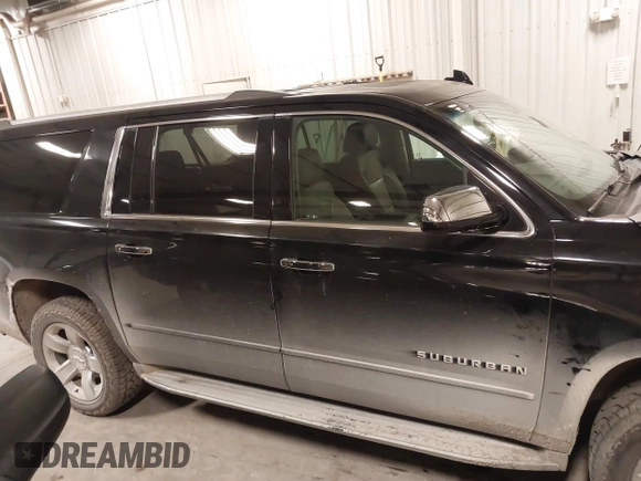 2017 Chevrolet Suburban Premier z VIN 1GNSKJKC0HR250854, wystawiony jako IAAI lot #41541476 z przebiegiem 128 231 mil mil oraz . Historia ofert i sprzedaży dostępna na DreamBid. Obrazek 13.