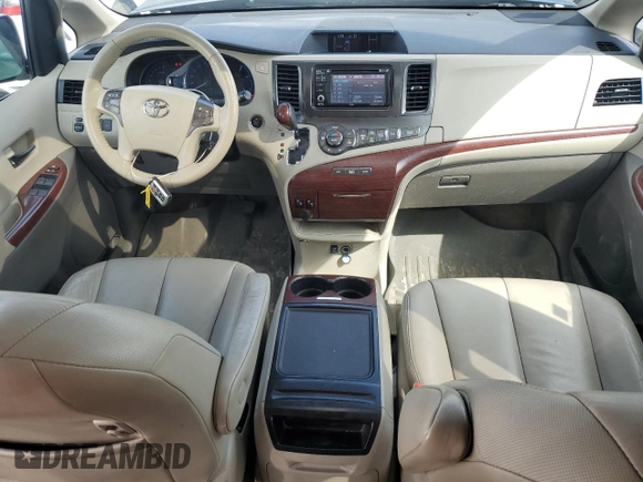 2013 Toyota Sienna XLE AAS with VIN 5TDYK3DC3DS392512, listed as a Copart auction lot 52815845 with 128,561 mi miles and Salvage Title. Bid and sale history available at carsss.com. Image 8.