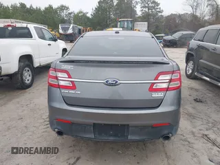 2014 Ford Taurus SHO with VIN 1FAHP2KT0EG171336, listed as a IAAI auction lot 41566688 with 154,328 mi miles. Bid and sale history available at carsss.com. Image 16.