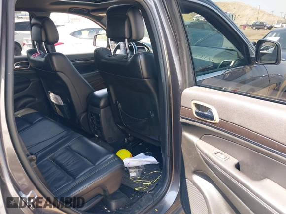2014 Jeep Grand Cherokee Limited with VIN 1C4RJFBG1EC325215, listed as a IAAI auction lot 42653200 with 139,743 mi miles and . Bid and sale history available at DreamBid. Image 8.