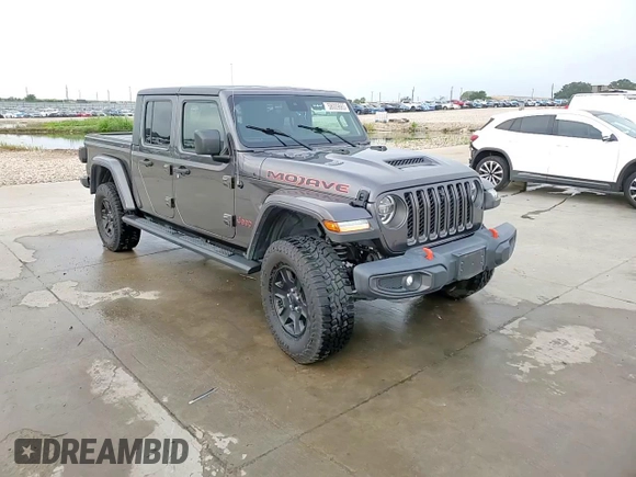 2020 Jeep Gladiator Mojave z VIN 1C6JJTEG8LL207481, wystawiony jako Copart lot #58009665 z przebiegiem 57 479 mil mil oraz Szkoda całkowita • Salvage title. Historia ofert i sprzedaży dostępna na DreamBid. Obrazek 13.