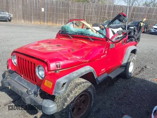 2004 Jeep Wrangler Sport with VIN 1J4FA49S14P803149, listed as a IAAI auction lot 42022481 with Not Provided miles. Bid and sale history available at carsss.com. Image 2.