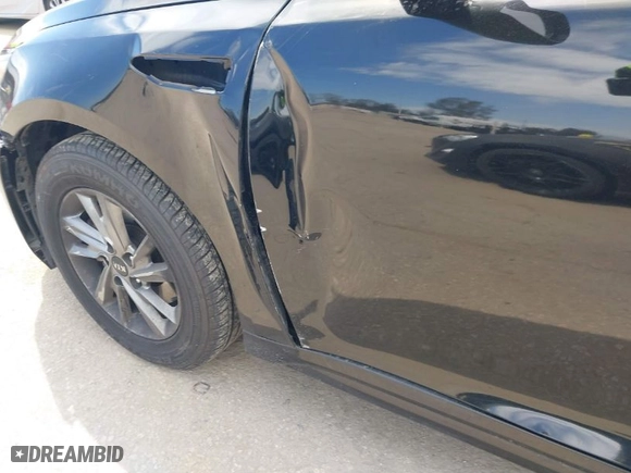 2019 Kia Optima S with VIN 5XXGT4L34KG296953, listed as a IAAI auction lot 42014999 with 64,968 mi miles. Bid and sale history available at carsss.com. Image 6.