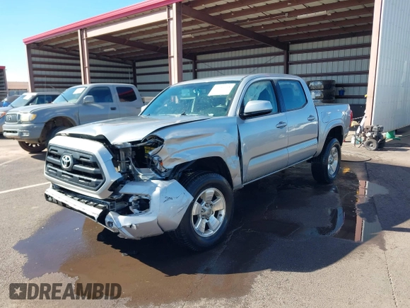 2017 Toyota Tacoma SR with VIN 5TFAX5GNXHX098715, listed as a IAAI auction lot 41381938 with 155,787 mi miles. Bid and sale history available at carsss.com. Image 2.