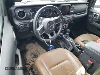 2023 Jeep Wrangler Sahara with VIN 1C4JJXP62PW553101, listed as a Copart auction lot 85543124 with 28,157 mi miles and Salvage Title. Bid and sale history available at DreamBid. Image 8.