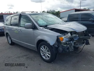 2018 Dodge Grand Caravan SXT z VIN 2C4RDGCG4JR179115, wystawiony jako IAAI lot #41163101 z przebiegiem 107 258 mil mil oraz . Historia ofert i sprzedaży dostępna na DreamBid. Obrazek 1.