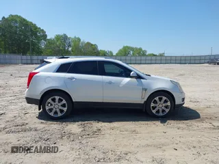 2013 Cadillac SRX Performance Collection with VIN 3GYFNDE34DS530275, listed as a IAAI auction lot 42148040 with 244,929 mi miles. Bid and sale history available at carsss.com. Image 13.