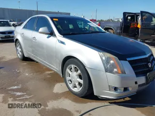 2008 Cadillac CTS RWD w/1SA with VIN 1G6DM577X80126306, listed as a IAAI auction lot 41771211 with 165,462 mi miles. Bid and sale history available at carsss.com. Image 1.