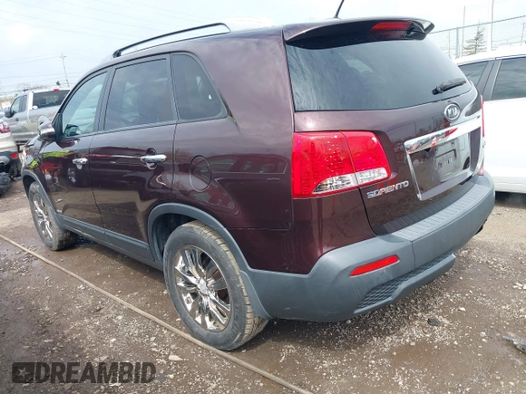 2011 Kia Sorento EX with VIN 5XYKUDA2XBG131874, listed as a IAAI auction lot 41901492 with 170,179 mi miles. Bid and sale history available at carsss.com. Image 3.