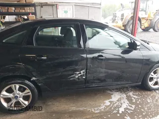 2013 Ford Focus SE with VIN 1FADP3F21DL333194, listed as a IAAI auction lot 42071641 with 107,912 mi miles. Bid and sale history available at carsss.com. Image 13.