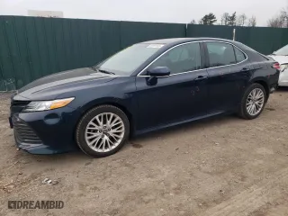 2019 Toyota Camry LE with VIN 4T1B11HK0KU256311, listed as a Copart auction lot 52597185 with 80,219 mi miles and Salvage Title. Bid and sale history available at carsss.com. Image 1.
