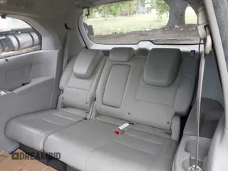 2012 Honda Odyssey Touring with VIN 5FNRL5H95CB101605, listed as a IAAI auction lot 42025163 with 286,421 mi miles. Bid and sale history available at carsss.com. Image 12.