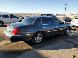 2002 Lincoln Town Car Signature z VIN 1LNHM82W02Y611525, wystawiony jako Copart lot #81514784 z przebiegiem 123 140 mil mil oraz Szkoda całkowita • Salvage title. Historia ofert i sprzedaży dostępna na DreamBid. Obrazek 3.