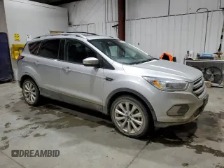 2018 Ford Escape Titanium with VIN 1FMCU9J95JUC62170, listed as a Copart auction lot 86991454 with 93,486 mi miles and Salvage title. Bid and sale history available at DreamBid. Image 4.