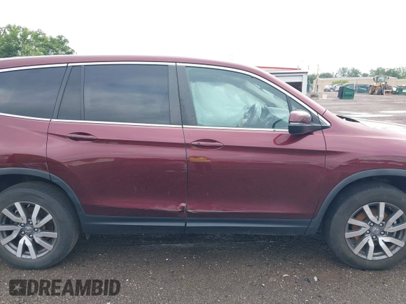 2021 Honda Pilot EX-L with VIN 5FNYF6H53MB094015, listed as a IAAI auction lot 42545722 with 66,065 mi miles and . Bid and sale history available at DreamBid. Image 13.