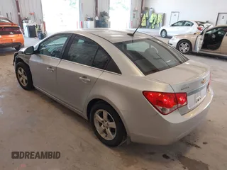 2014 Chevrolet Cruze 1LT with VIN 1G1PC5SB2E7296549, listed as a IAAI auction lot 42797744 with 137,343 mi miles and . Bid and sale history available at DreamBid. Image 3.