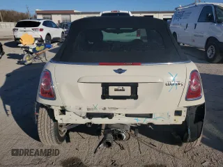 2015 MINI Convertible S with VIN WMWZP3C52FT708377, listed as a Copart auction lot 79817344 with 54,466 mi miles and Salvage title. Bid and sale history available at DreamBid. Image 6.