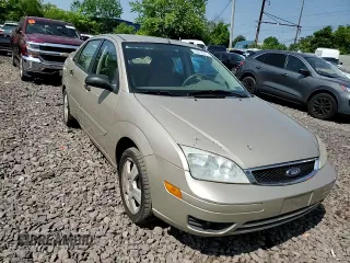 2006 Ford Focus S z VIN 1FAFP34N96W111431, wystawiony jako Copart lot #59478815 z przebiegiem Nie podano mil oraz Szkoda całkowita • Salvage title. Historia ofert i sprzedaży dostępna na DreamBid. Obrazek 13.