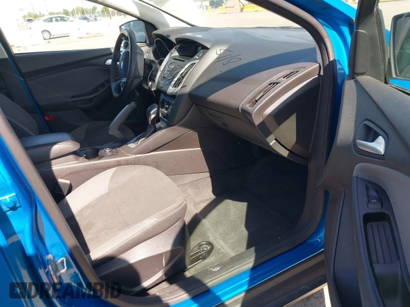 2013 Ford Focus SE z VIN 1FADP3F2XDL178239, wystawiony jako IAAI lot #42272364 z przebiegiem 108 773 mil mil oraz . Historia ofert i sprzedaży dostępna na DreamBid. Obrazek 5.