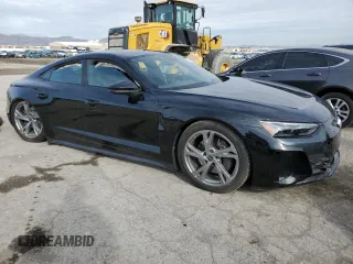 2023 Audi e-tron GT Premium Plus z VIN WAUFJBFWXP7003131, wystawiony jako Copart lot #38763864 z przebiegiem 16 636 mil mil oraz . Historia ofert i sprzedaży dostępna na DreamBid. Obrazek 4.