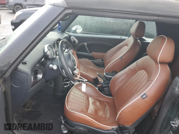 2007 MINI Convertible S with VIN WMWRH33517TL95143, listed as a Copart auction lot 88068045 with 115,827 mi miles and Salvage title. Bid and sale history available at DreamBid. Image 7.