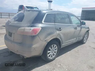 2010 Mazda CX-9 Sport with VIN JM3TB2MA1A0218687, listed as a IAAI auction lot 42012189 with 134,912 mi miles and . Bid and sale history available at DreamBid. Image 4.