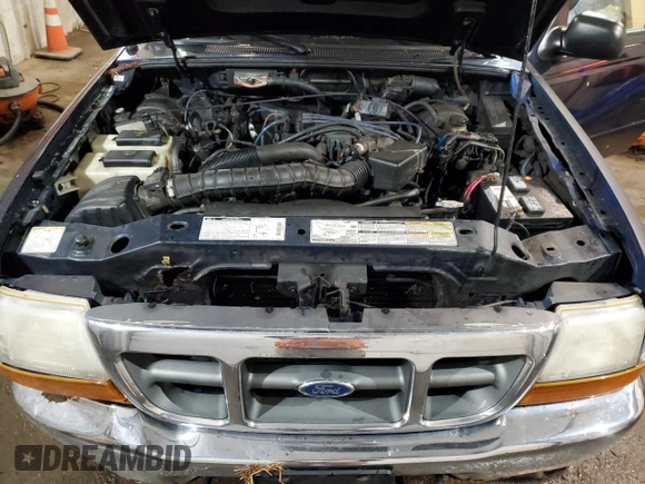 2000 Ford Ranger XL with VIN 1FTZR15V8YTA83226, listed as a Copart auction lot 51004555 with 218,083 mi miles and Salvage title. Bid and sale history available at DreamBid. Image 12.