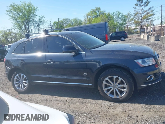 2014 Audi Q5 Premium Plus z VIN WA1LFBFP4EA006181, wystawiony jako IAAI lot #42140321 z przebiegiem 104 870 mil mil oraz . Historia ofert i sprzedaży dostępna na DreamBid. Obrazek 13.