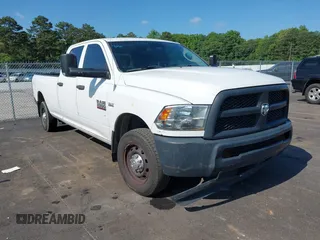 2014 Ram 2500 Tradesman z VIN 3C6TR4HT8EG120941, wystawiony jako IAAI lot #42455945 z przebiegiem 101 726 mil mil oraz . Historia ofert i sprzedaży dostępna na DreamBid. Obrazek 1.