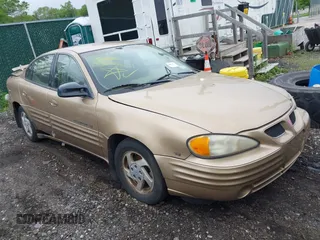 1999 Pontiac Grand Am SE1 with VIN 1G2NE52EXXC504615, listed as a IAAI auction lot 42404858 with Not provided miles and . Bid and sale history available at DreamBid. Image 1.