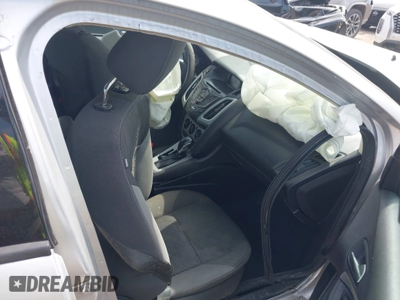 2015 Ford Focus Titanium with VIN 1FADP3J27FL347983, listed as a IAAI auction lot 42634821 with 156,216 mi miles and . Bid and sale history available at DreamBid. Image 5.