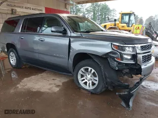 2020 Chevrolet Suburban LT with VIN 1GNSKHKC0LR282818, listed as a IAAI auction lot 41539280 with 116,041 mi miles. Bid and sale history available at carsss.com. Image 1.