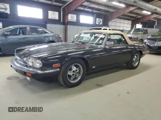 1988 Jaguar XJS z VIN SAJNV5843JC147927, wystawiony jako Copart lot #58988575 z przebiegiem 81 239 mil mil oraz Tytuł czysty. Historia ofert i sprzedaży dostępna na DreamBid. Obrazek 1.