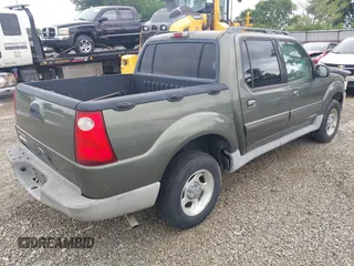 2002 Ford Explorer Sport Trac Value z VIN 1FMZU77E42UC02871, wystawiony jako IAAI lot #42470829 z przebiegiem 151 070 mil mil oraz . Historia ofert i sprzedaży dostępna na DreamBid. Obrazek 4.