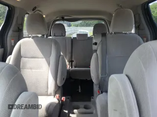 2015 Toyota Sienna LE AAS with VIN 5TDKK3DC9FS609084, listed as a Copart auction lot 57055295 with 247,531 mi miles and Salvage title. Bid and sale history available at DreamBid. Image 10.