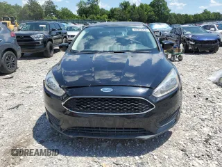 2018 Ford Focus SE z VIN 1FADP3F22JL265175, wystawiony jako Copart lot #62916255 z przebiegiem 90 348 mil mil oraz Szkoda całkowita • Salvage title. Historia ofert i sprzedaży dostępna na DreamBid. Obrazek 5.