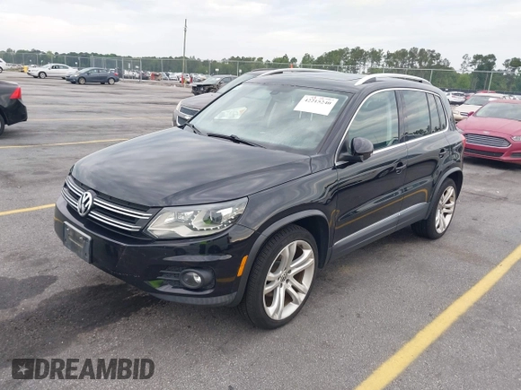 2012 Volkswagen Tiguan S with VIN WVGBV7AX6CW592242, listed as a IAAI auction lot 42215240 with 158,852 mi miles and . Bid and sale history available at DreamBid. Image 2.