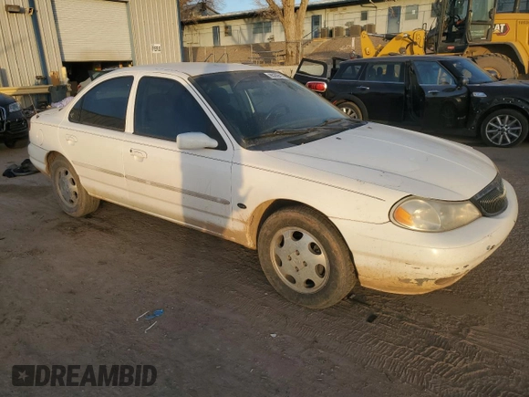 1999 Mercury Mystique GS z VIN 1MEFM6532XK638087, wystawiony jako Copart lot #85269414 z przebiegiem 192 506 mil mil oraz Szkody całkowita. Historia ofert i sprzedaży dostępna na DreamBid. Obrazek 4.