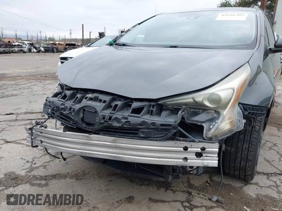 2016 Toyota Prius Four with VIN JTDKARFU8G3015083, listed as a IAAI auction lot 42191765 with 168,820 mi miles and . Bid and sale history available at DreamBid. Image 18.