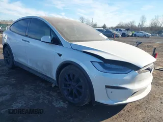 2022 Tesla Model X with VIN 7SAXCDE57NF343370, listed as a IAAI auction lot 41406156 with Not Provided miles and . Bid and sale history available at DreamBid. Image 1.
