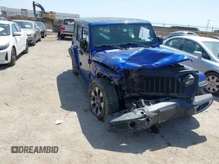 2018 Jeep Wrangler Unlimited Sahara z VIN 1C4HJXEN4JW321227, wystawiony jako IAAI lot #42002735 z przebiegiem 114 293 mil mil oraz . Historia ofert i sprzedaży dostępna na DreamBid. Obrazek 1.